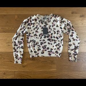 100% Leopard print cashmere sweater by Naadam Studio.